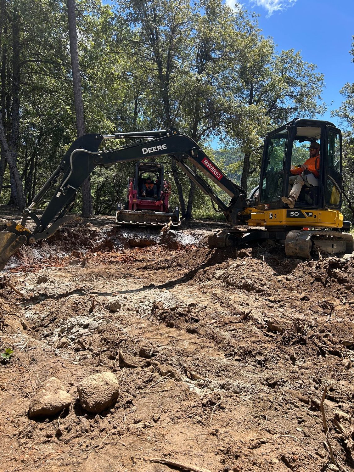 Building pad graded and compacted on a property