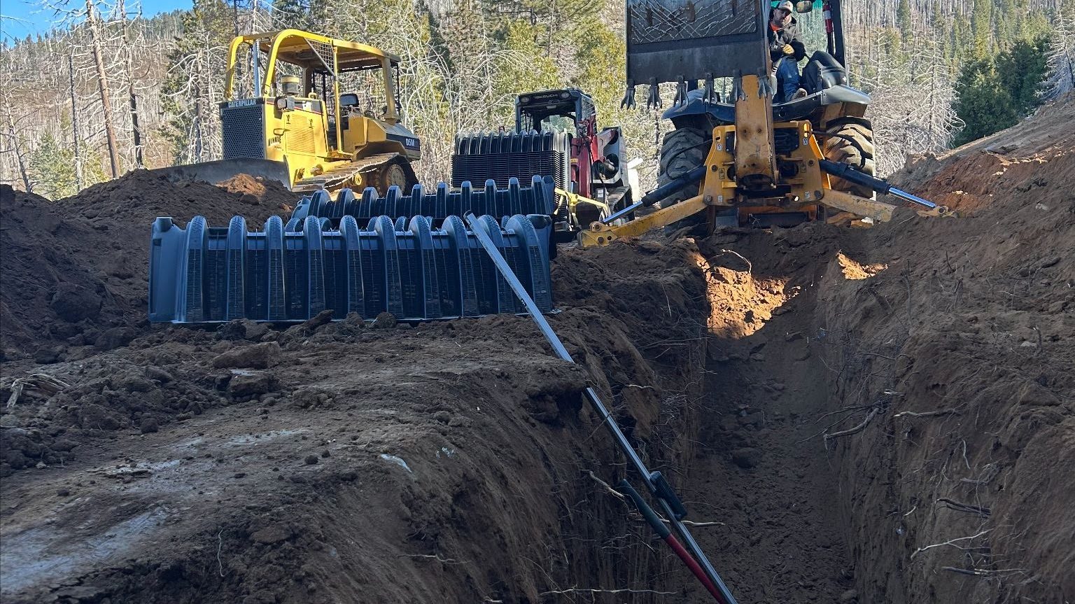 Underground septic pipe installation in a trench